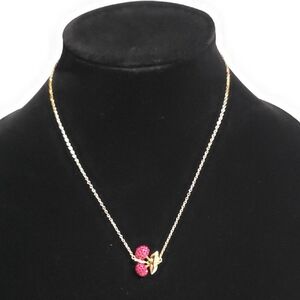 Coach Gold Necklace with Pink Ladybug Charm